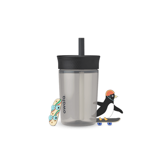 Full profile shot of the 15oz Plastic Tumbler 'Skate Park,' featuring a cartoon penguin on a skateboard beside it.