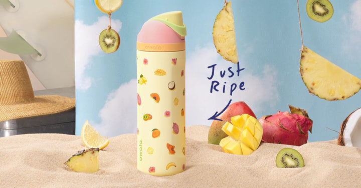 Birthday Bash bottles with colorful beach-inspired props