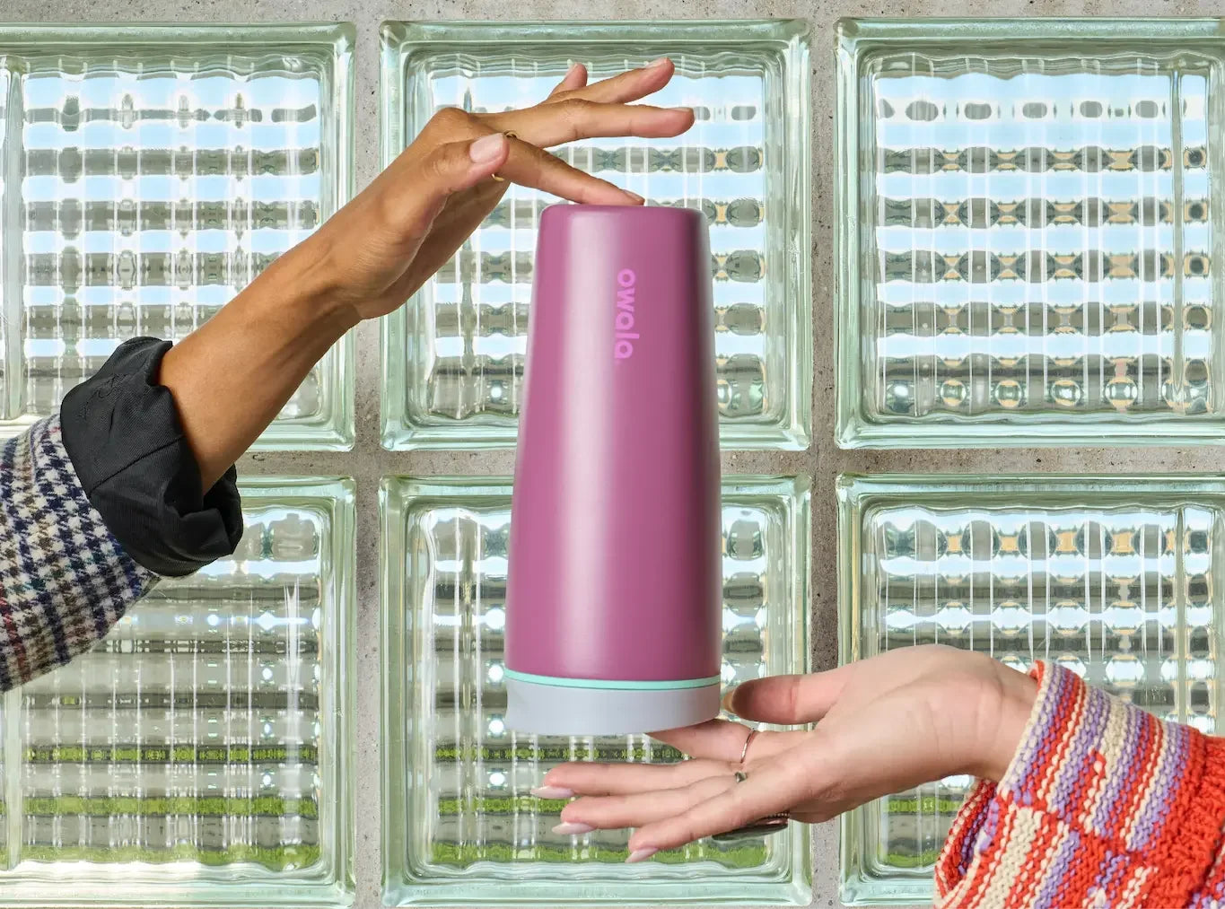 SmoothSip Slider floating between two hands